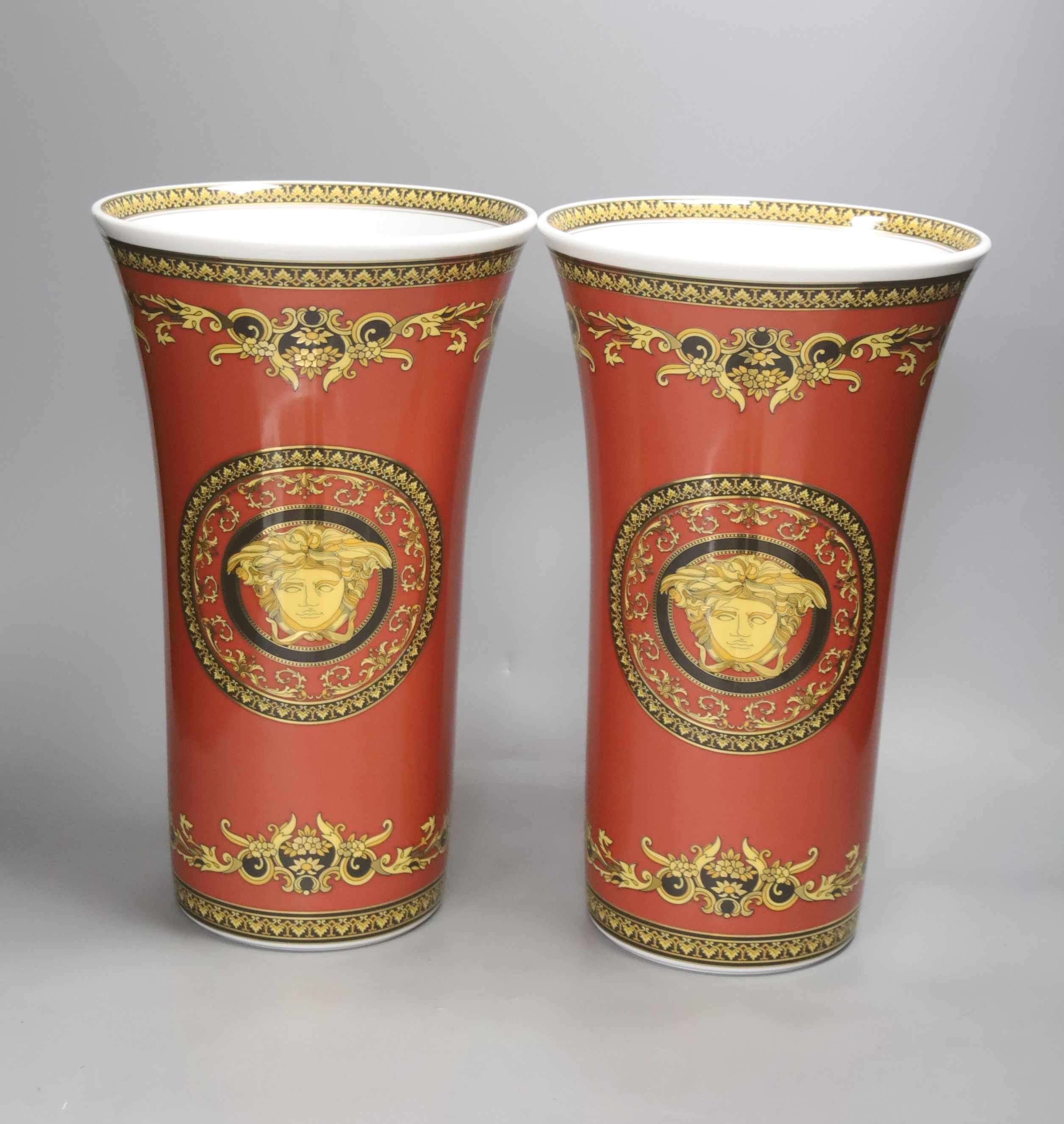 A pair of Rosenthal Versace 'Medusa Red' tapered vases, height 34cm H 34cm